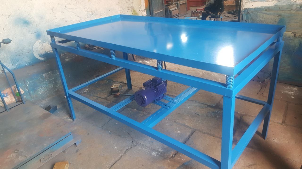 Freshly fabricated blue steel machinery inside the Alem Engineering workshop